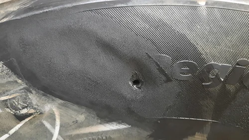 Sidewall repair, original photograph 3